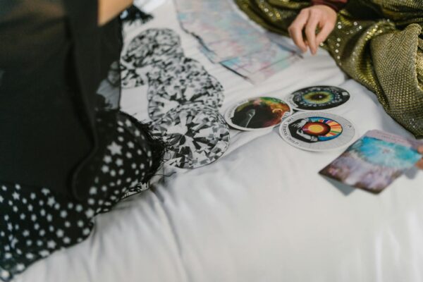 A mystical scene showing an intimate tarot card reading, exploring spiritual energy.